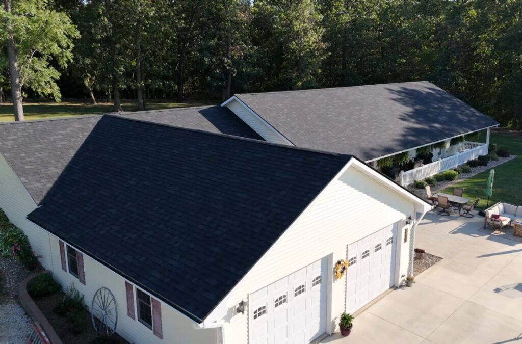 A Surge Exteriors team member delivering roof repair in Kirksville, MO, highlighting expert care for secure, long-lasting performance.